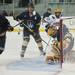 The puck rolls over the goal in the game between Michigan and Windsor on Tuesday. Daniel Brenner I AnnArbor.com